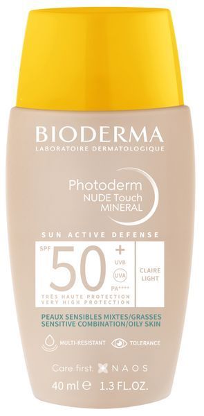 Сонцезахисний тональний флюїд для обличчя Bioderma Photoderm Nude Touch Mineral SPF 50+ РА++++, Claire Light, 40мл.  1807 фото