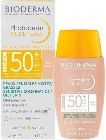 Сонцезахисний тональний флюїд для обличчя Bioderma Photoderm Nude Touch Mineral SPF 50+ РА++++, Claire Light, 40мл.  1807 фото
